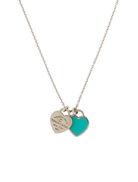 tiffany two heart pendant|More.